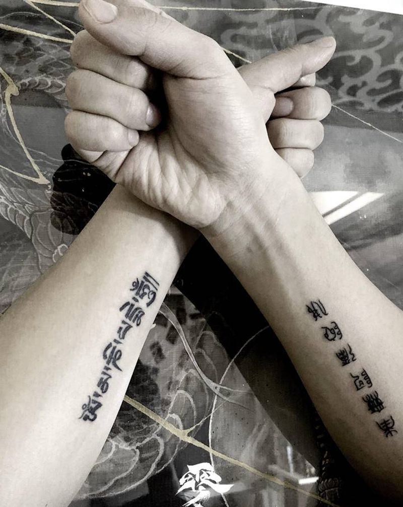 六字真言纹身图片_手臂纹身图案