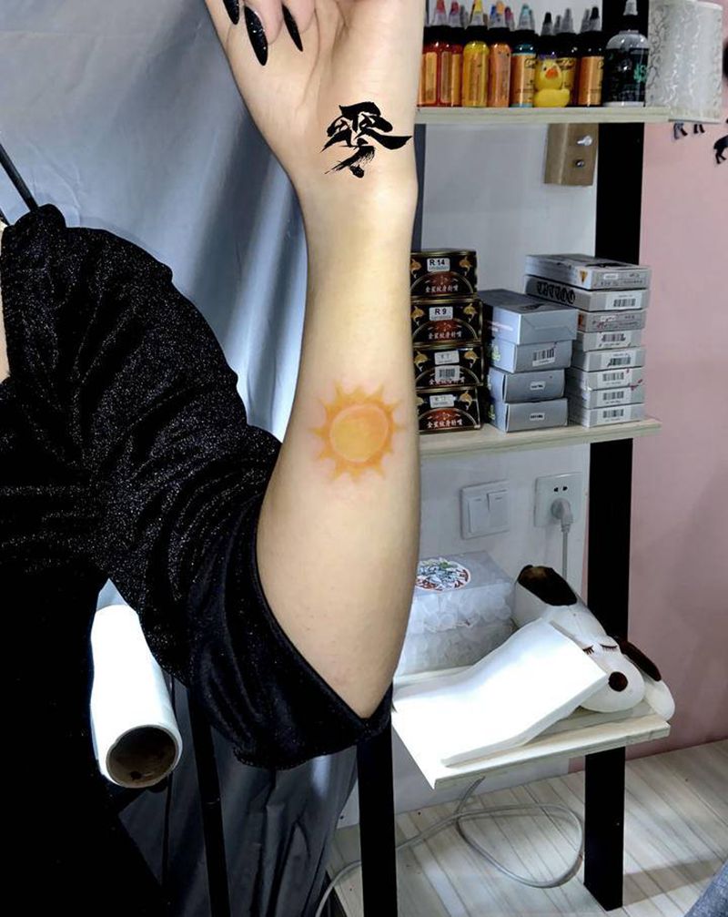 小太阳纹身图片_手臂纹身图案