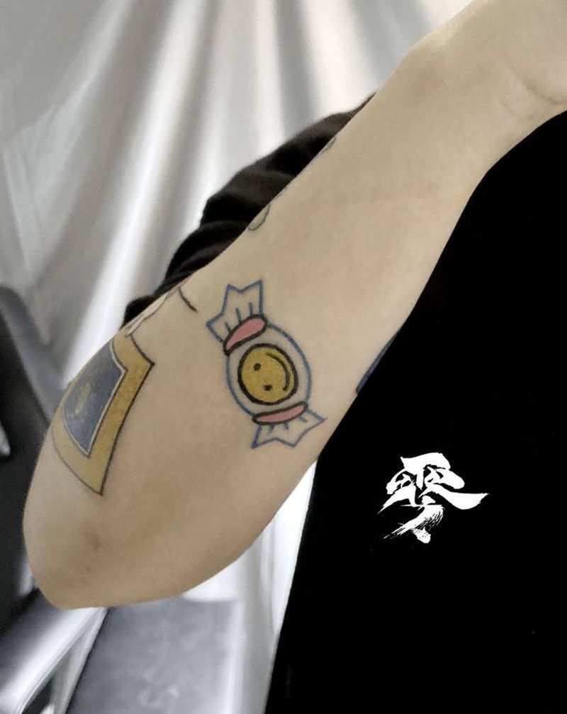 糖果纹身图片_手臂纹身图案