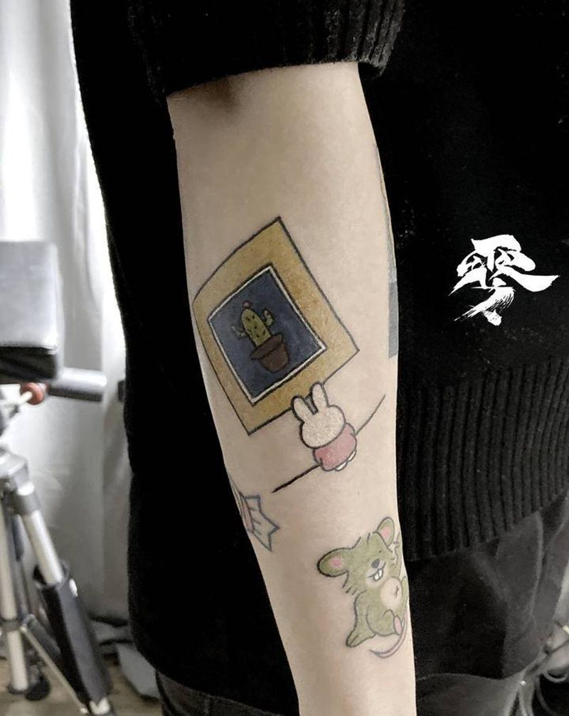 小兔子看画纹身图片_手臂纹身图案