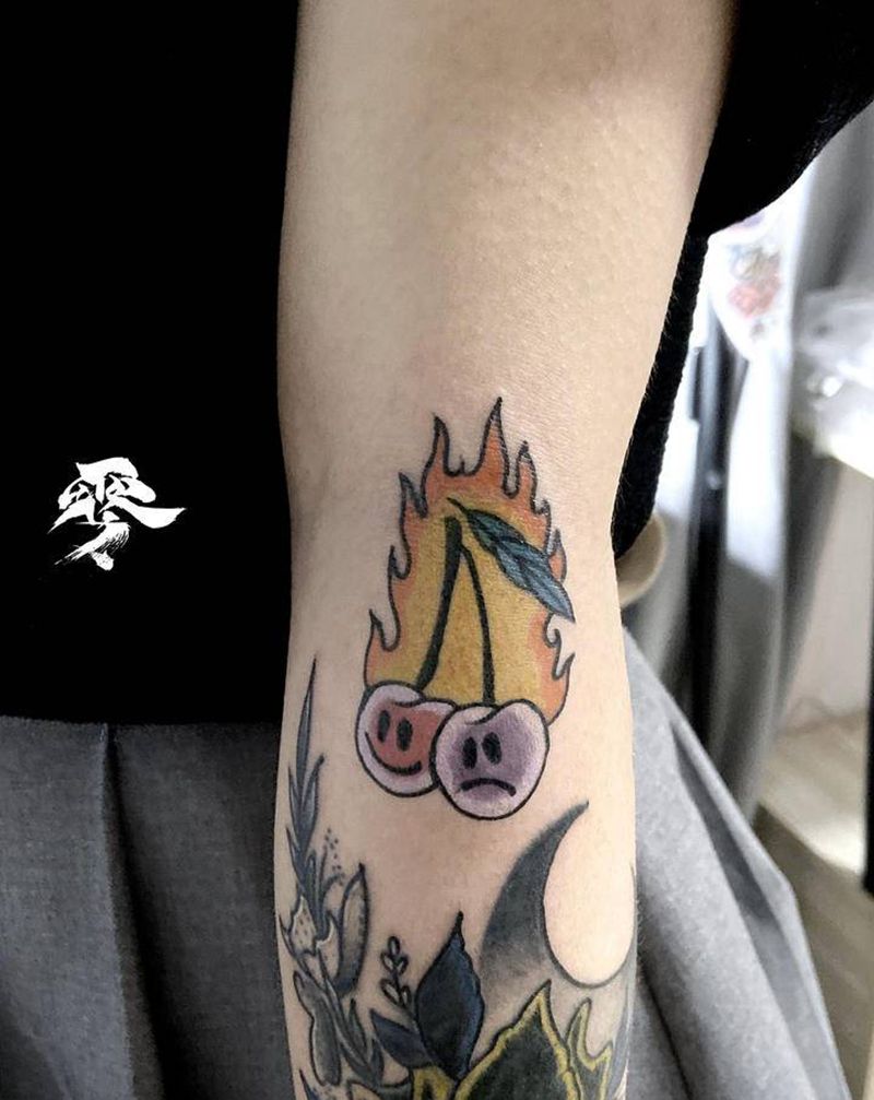 樱桃炸弹纹身图片_手臂Old School纹身图案