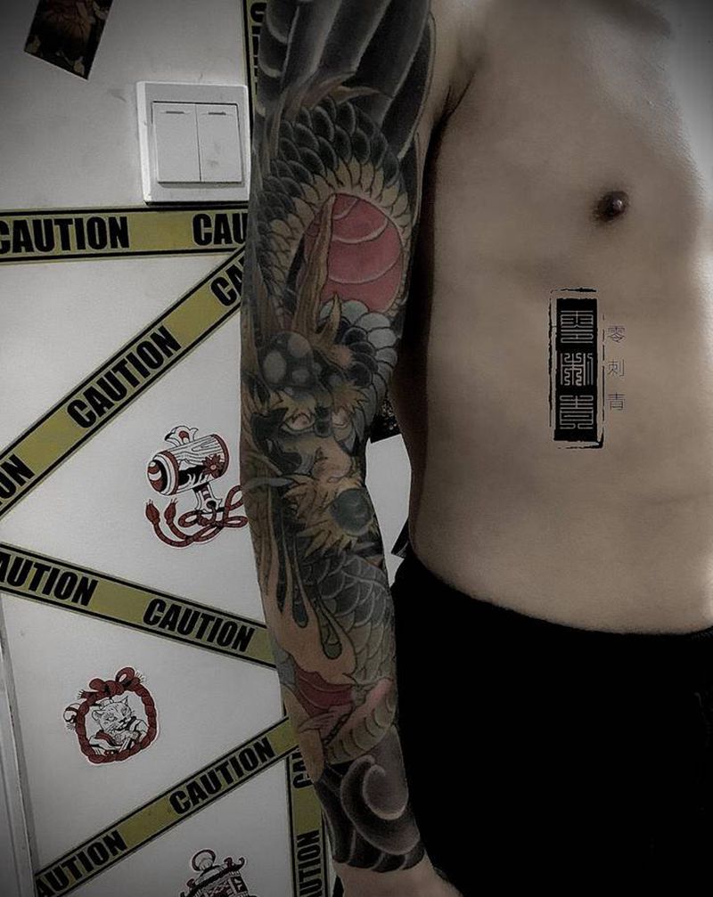 花臂龙纹身图片_手臂纹身图案