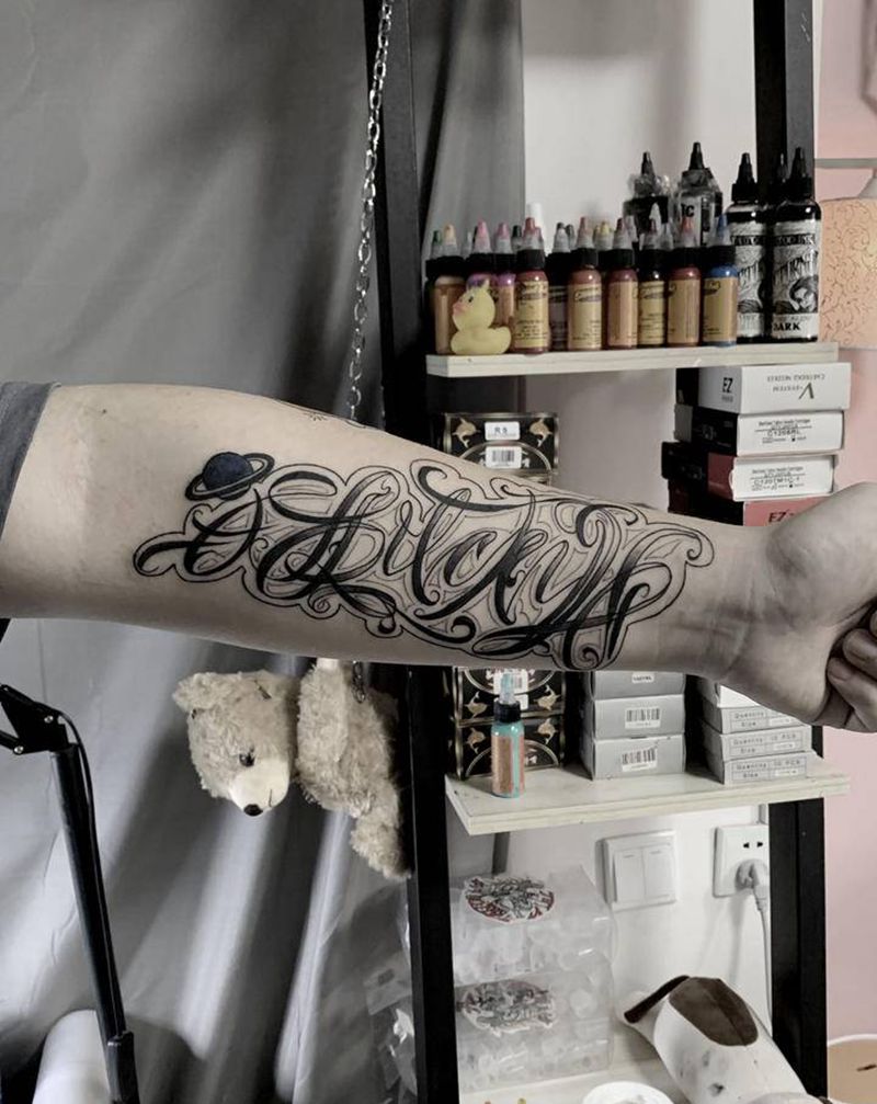 花体字纹身图片_手臂纹身图案