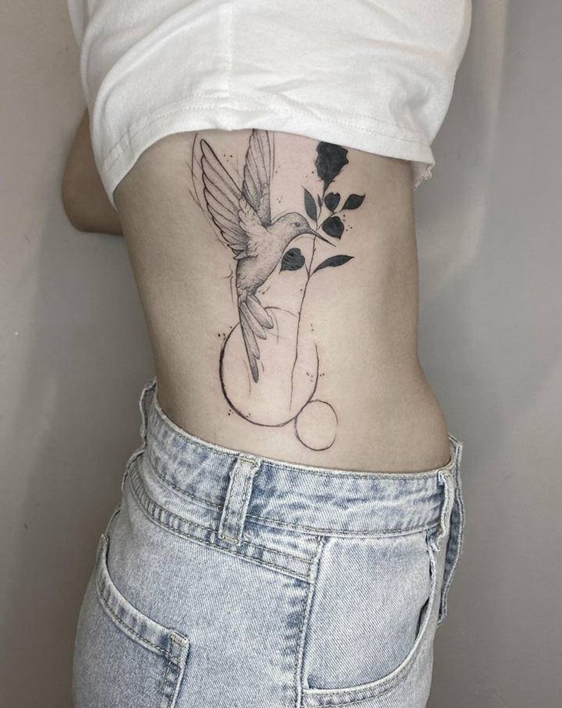 鸟纹身图片_腰部点刺纹身图案
