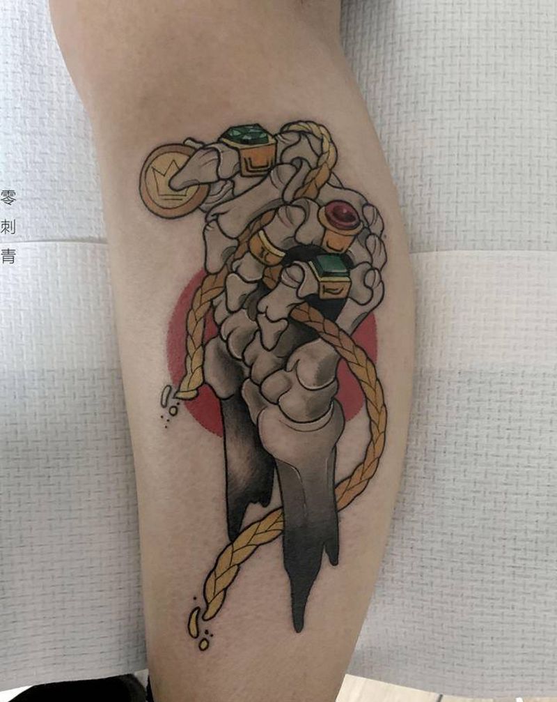 骷髅手纹身图片_腿部纹身图案