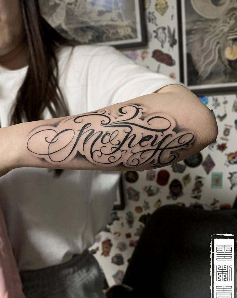 花体字纹身图片_手臂纹身图案