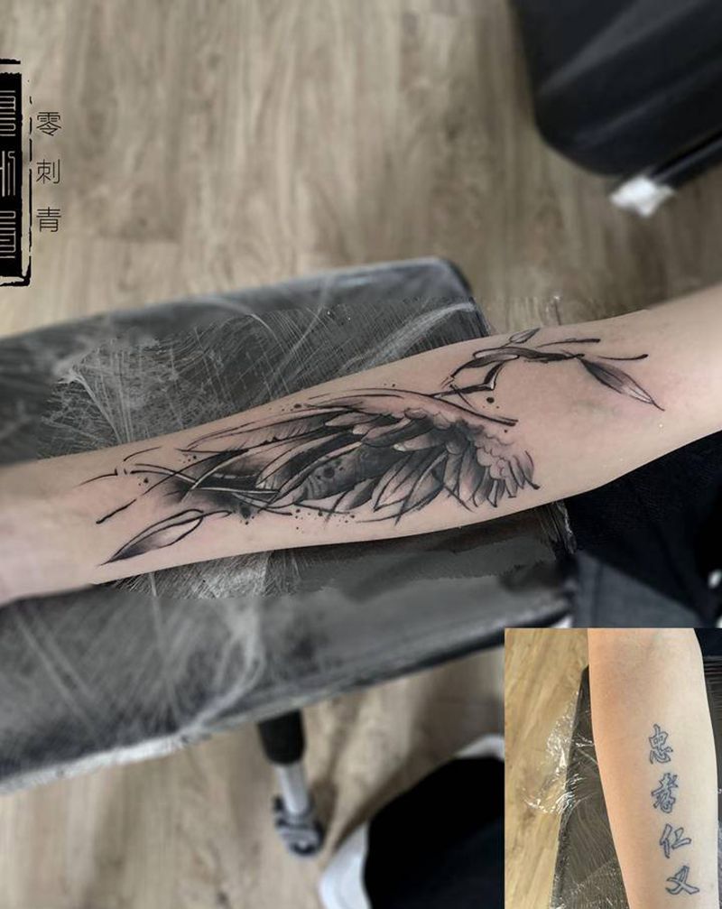 翅膀遮盖纹身图片_手臂纹身图案