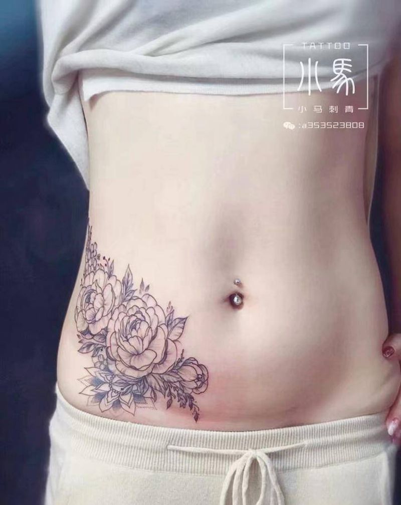 素花纹身图片_腰部腹部线条素花纹身图案