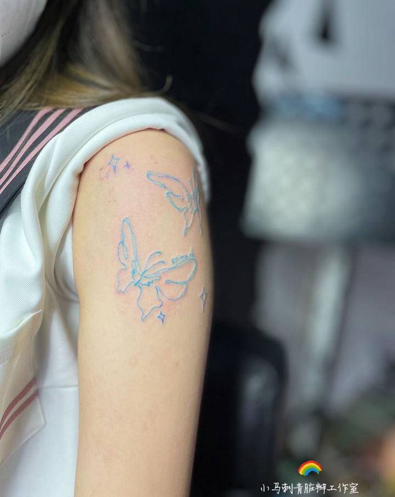夏日蓝蝴蝶纹身图片_手臂纹身图案