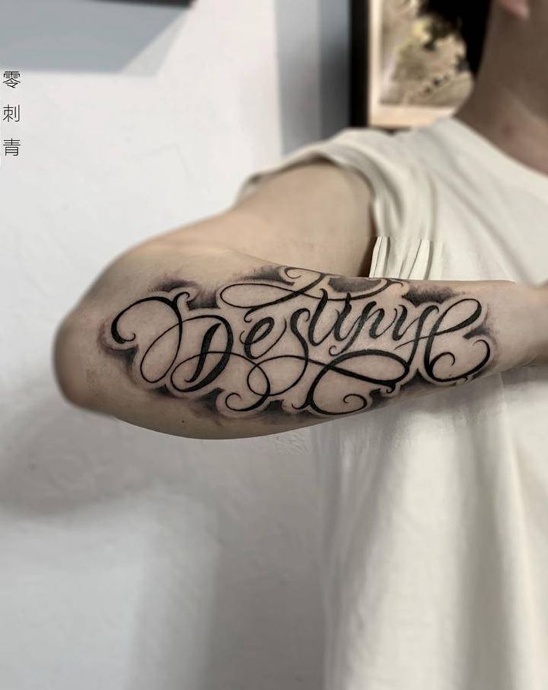花体字纹身图片_手臂花体字纹身图案