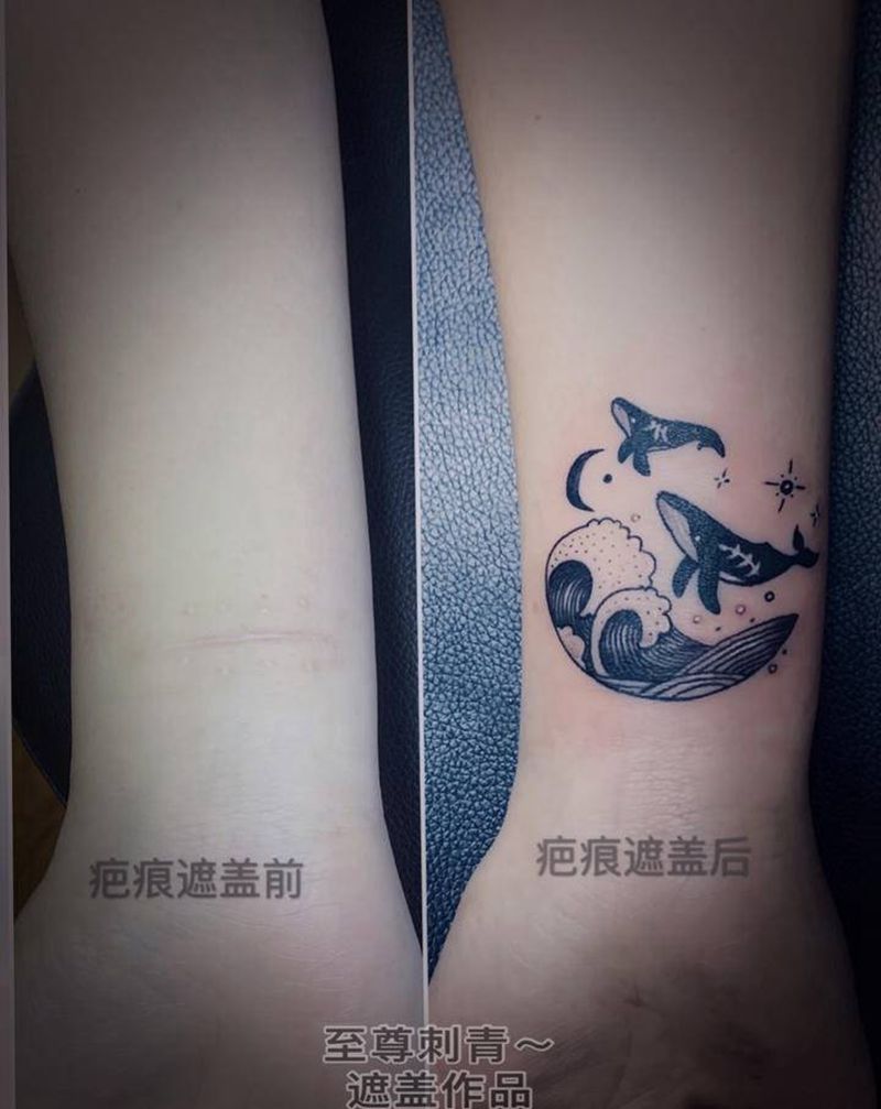 海豚湾纹身图片_手臂点刺几何纹身图案