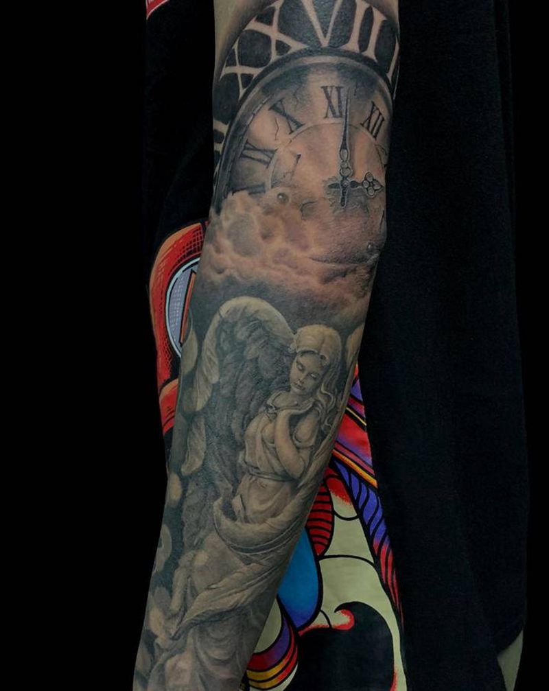 欧美写实接花臂纹身图片_手臂欧美写实表雕塑天使纹身图案