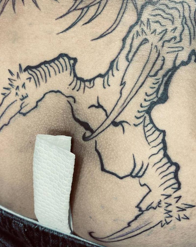 龙爪纹身图片_腰部新传统纹身图案