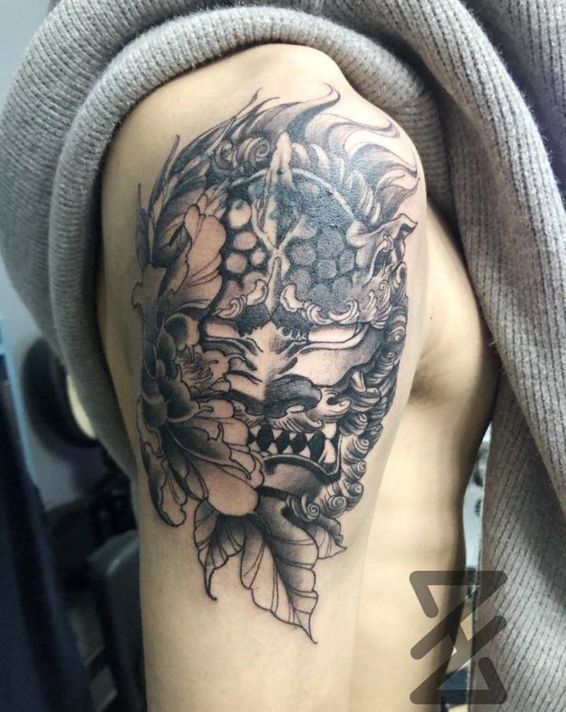 唐狮遮盖纹身图片_手臂纹身图案