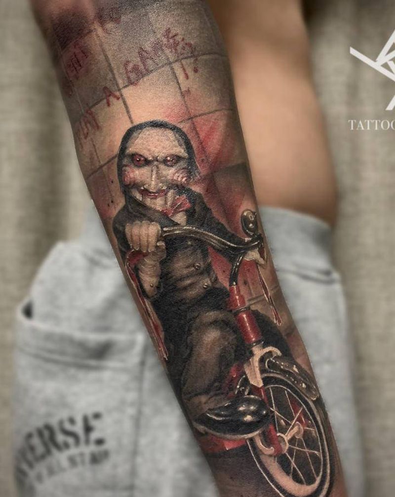 Saw纹身图片_手臂欧美写实电锯惊魂纹身图案