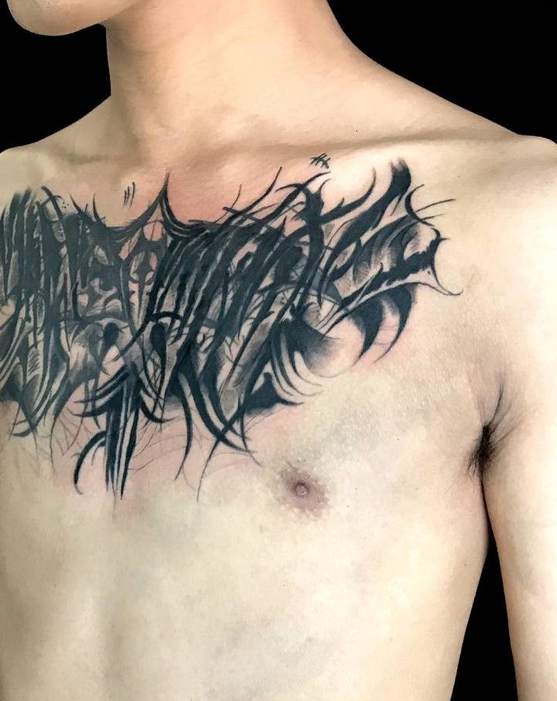 花体字遮盖纹身图片_胸部花体字纹身图案