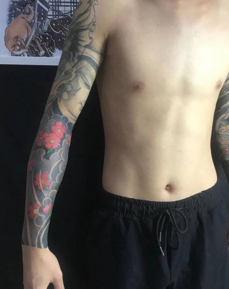 樱花臂衔接纹身图片_手臂纹身图案