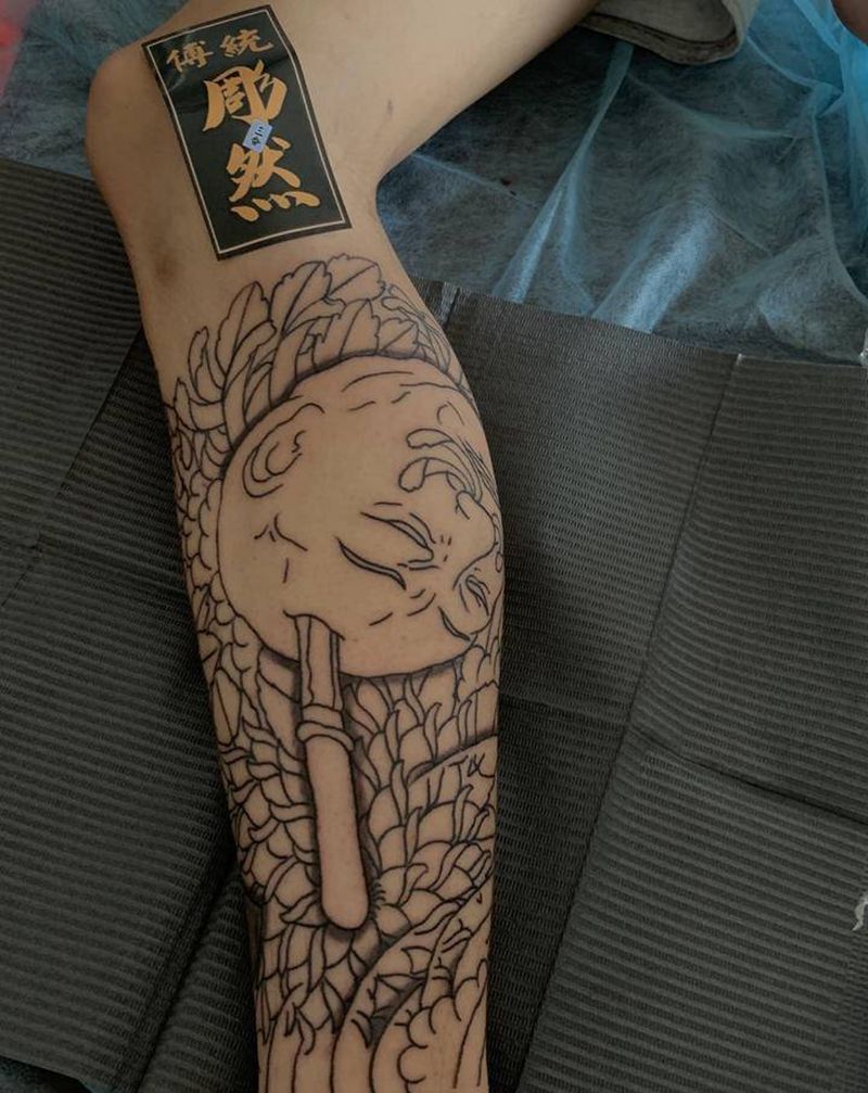 生首菊纹身图片_腿部老传统纹身图案