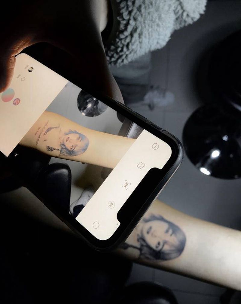 肖像纹身图片_手臂写实纹身图案