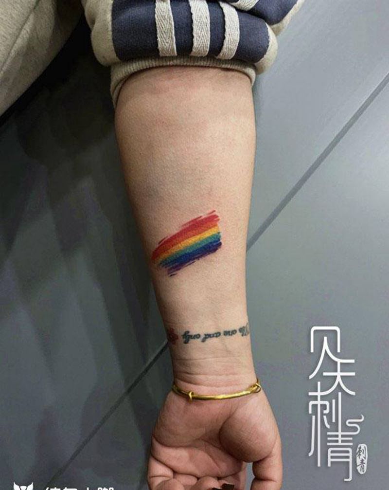 彩虹纹身图片_手臂水彩纹身图案