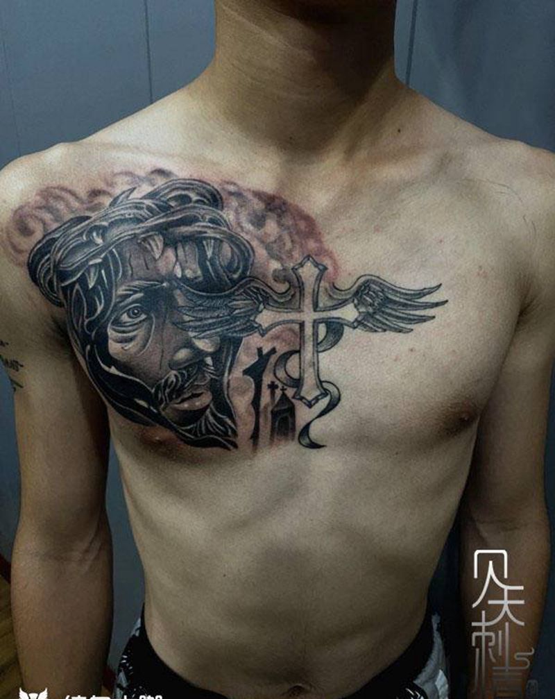 耶稣纹身图片_胸部纹身图案