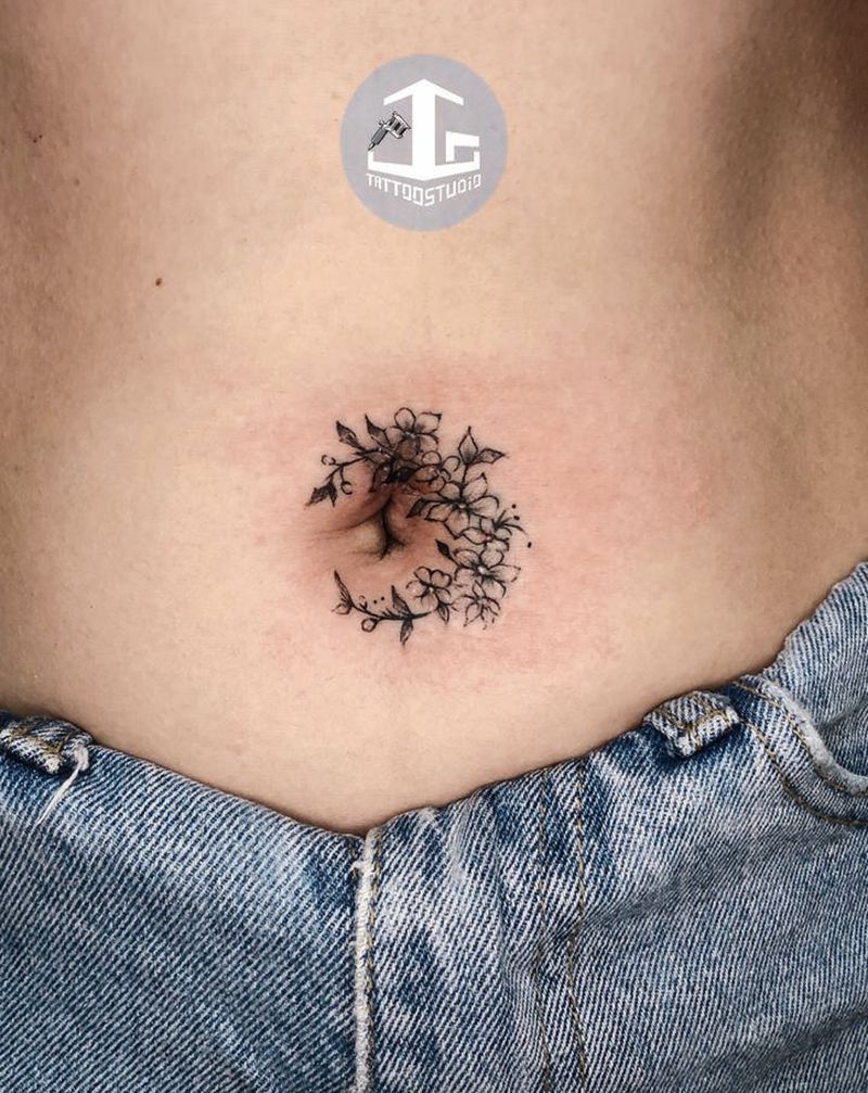 素花纹身图片_腹部点刺素花纹身图案