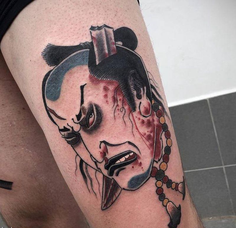 穿头纹身图片_腿部老传统纹身图案