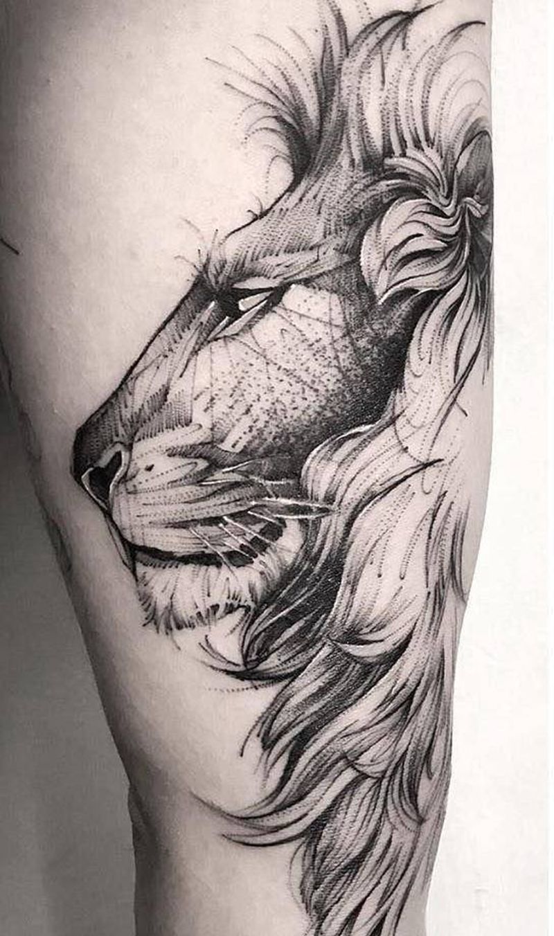 侧脸狮子王纹身图片_腿部几何点刺纹身图案