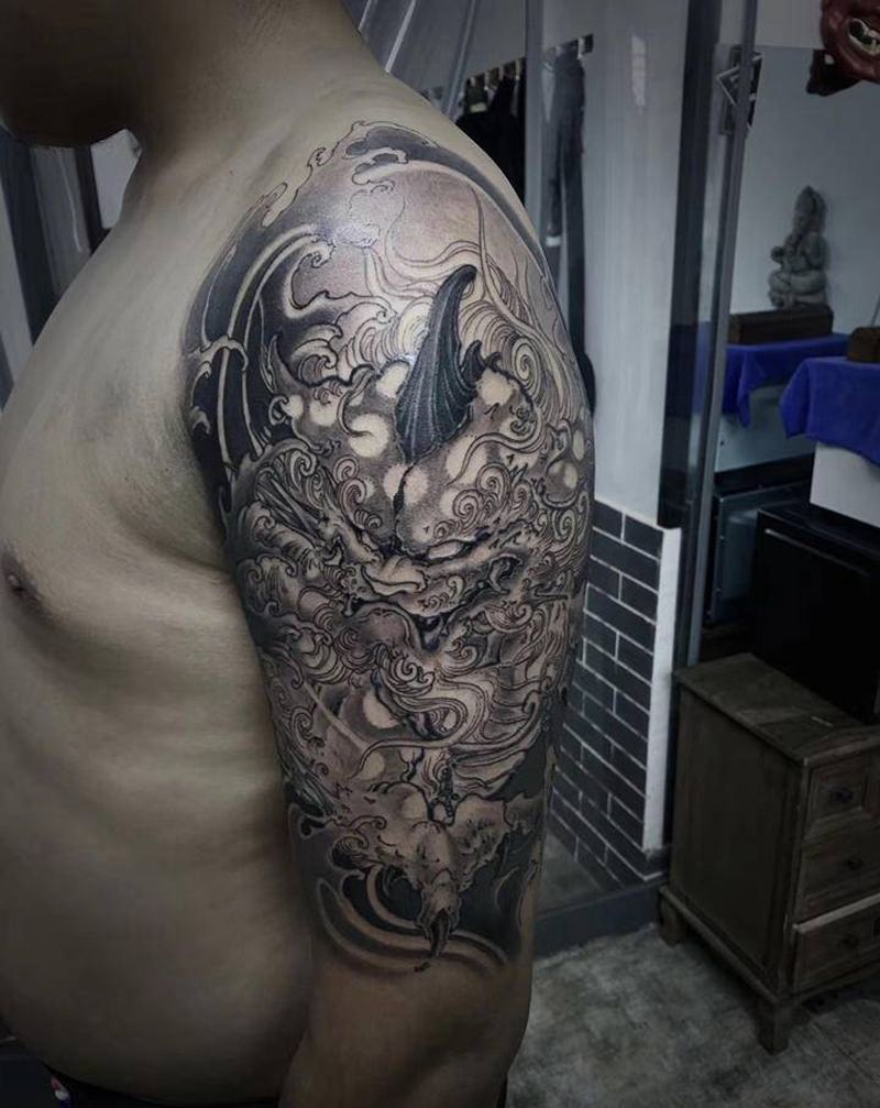 唐狮纹身图片_手臂新传统纹身图案