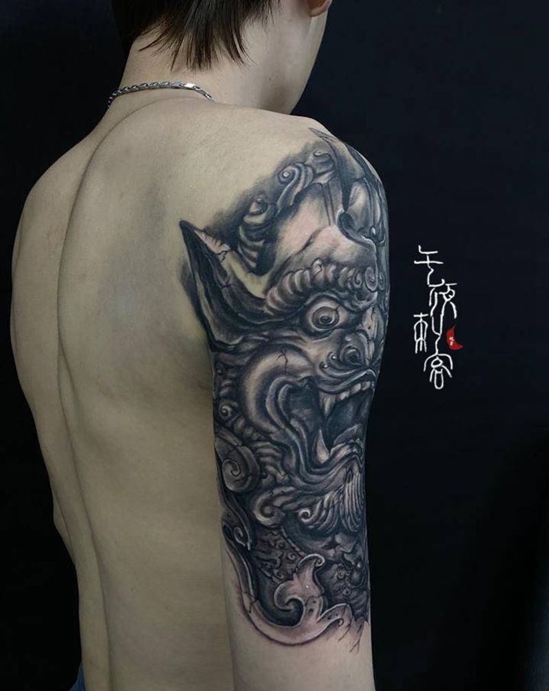 石雕唐狮纹身图片_手臂新传统欧美写实纹身图案