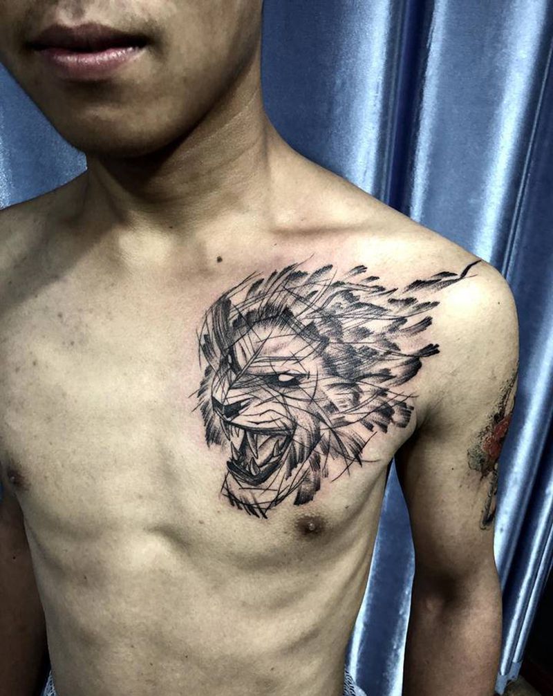 狮子头纹身图片_胸部点刺纹身图案
