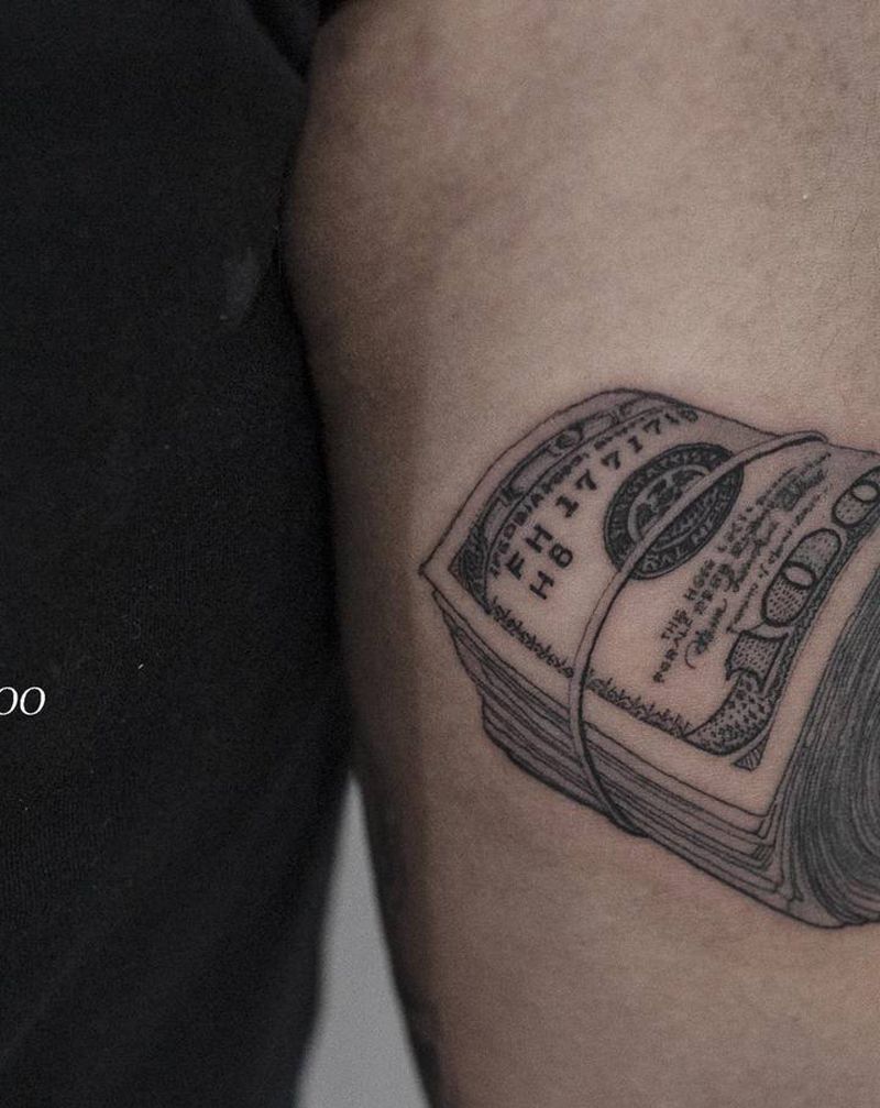 钞票纹身图片_手臂肩部欧美写实New School纹身图案