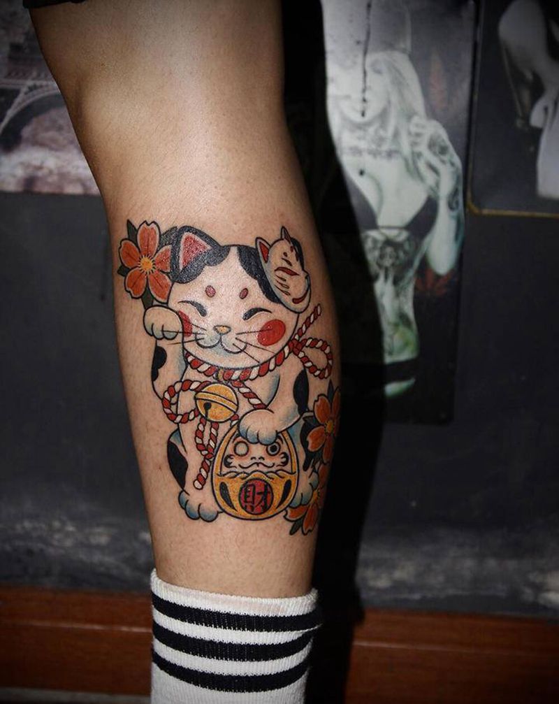 招财猫纹身图片_腿部老传统新传统纹身图案