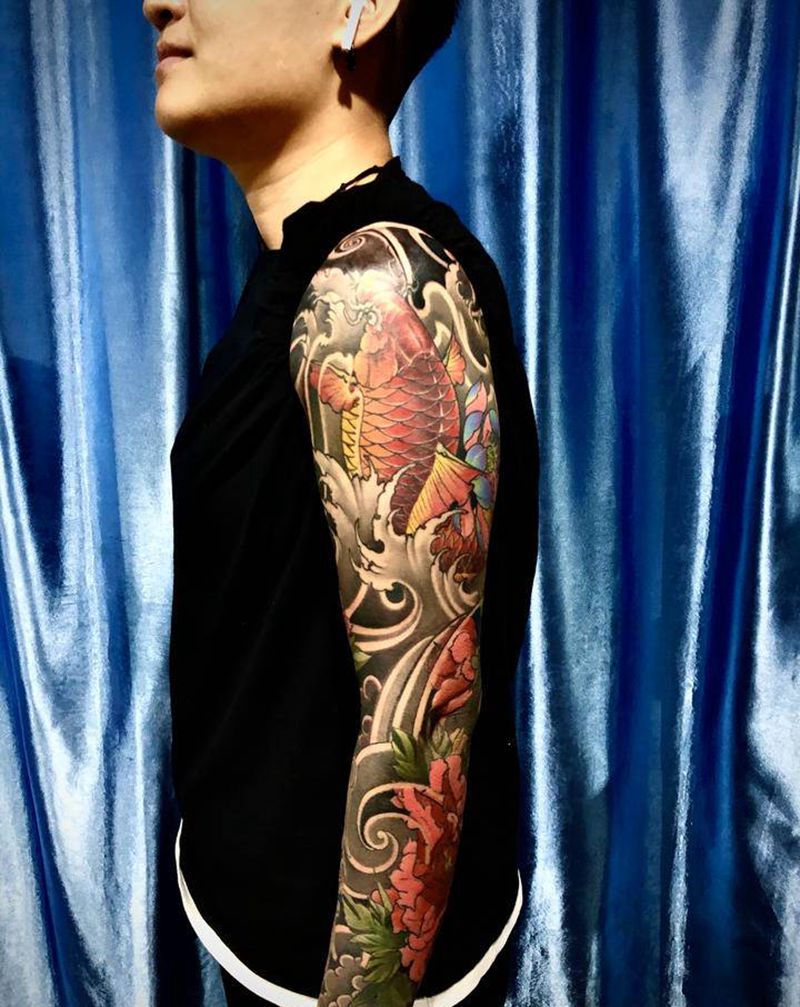 包臂纹身图片_手臂新传统纹身图案