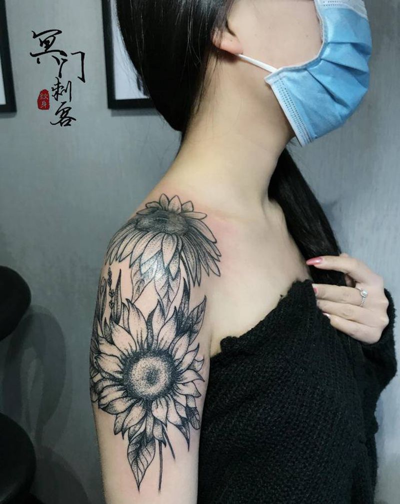 太阳花纹身图片_手臂点刺纹身图案