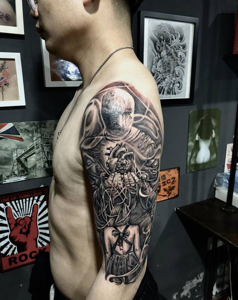 包臂未完纹身图片_欧美写实纹身图案