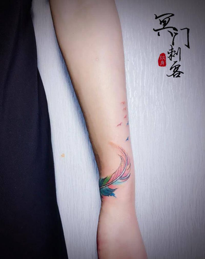 羽毛纹身图片_手臂羽毛纹身图案