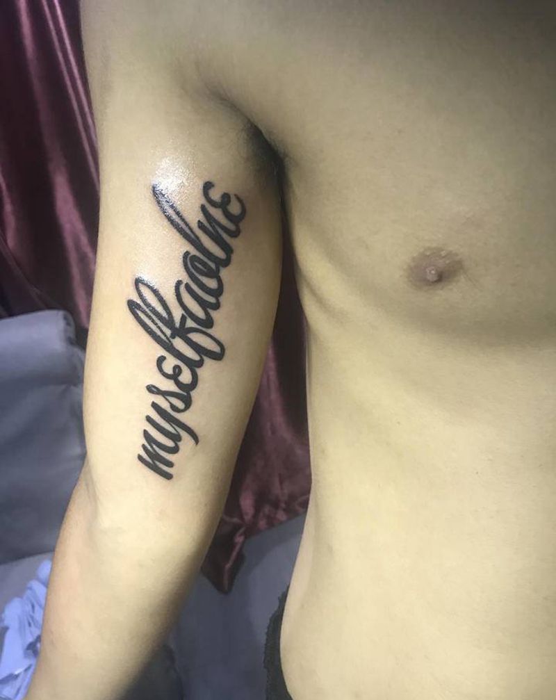 字母纹身图片_手臂花体字纹身图案