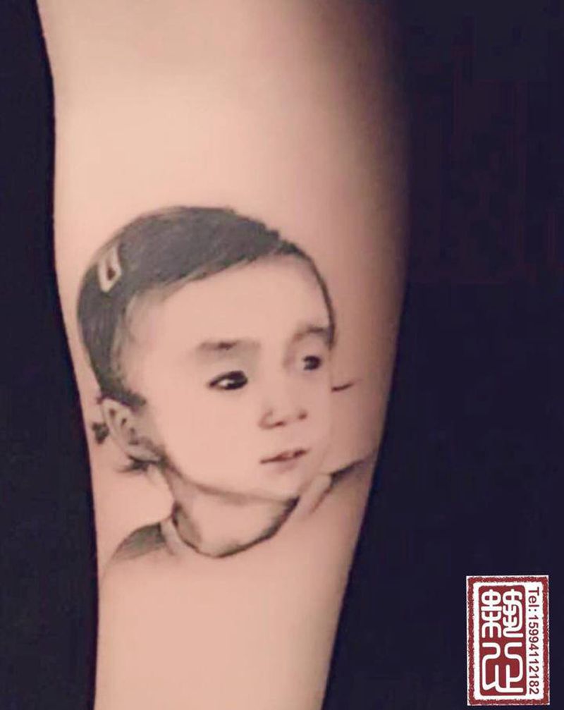 肖像纹身图片_手臂欧美写实纹身图案