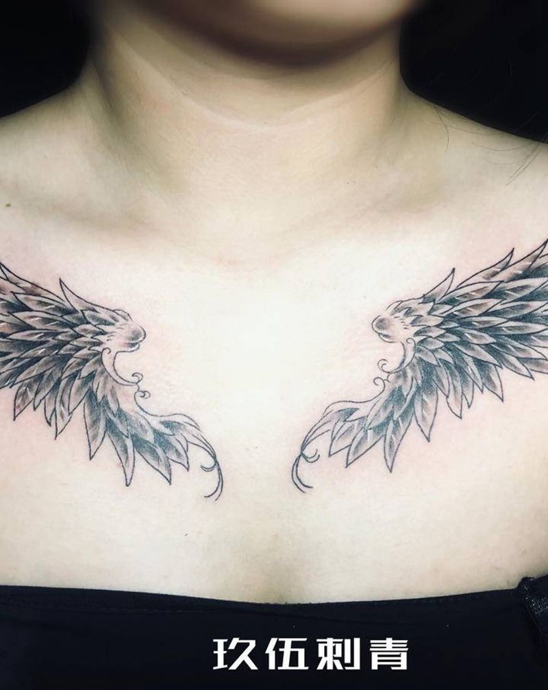 翅膀纹身纹身图片_胸部欧美写实纹身图案