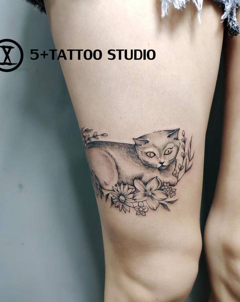 喵星人纹身图片_腿部点刺纹身图案