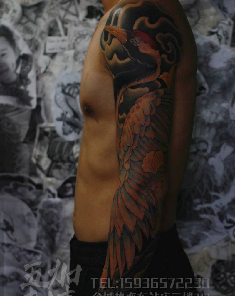 闲云野鹤纹身图片_手臂新传统纹身图案