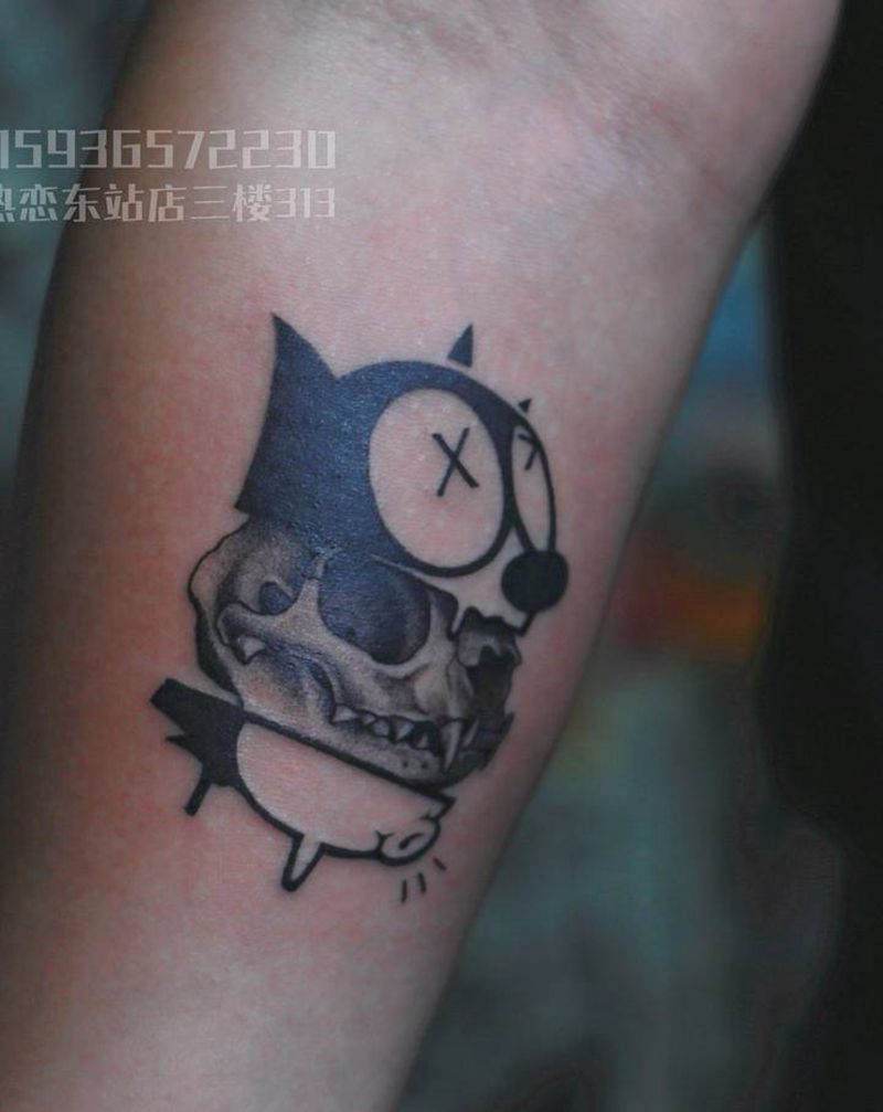 菲力猫纹身图片_手臂点刺纹身图案