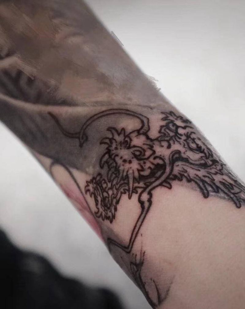 传统小龙纹身图片_手臂纹身图案