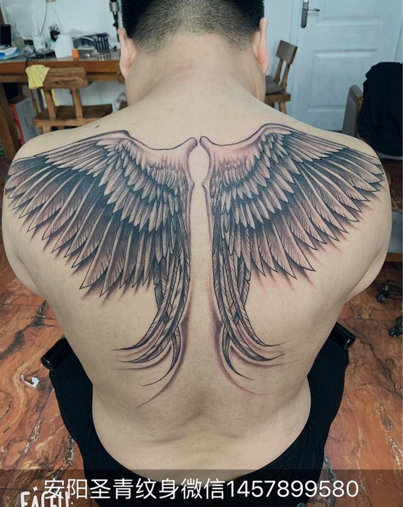 翅膀纹身图片_新传统纹身图案