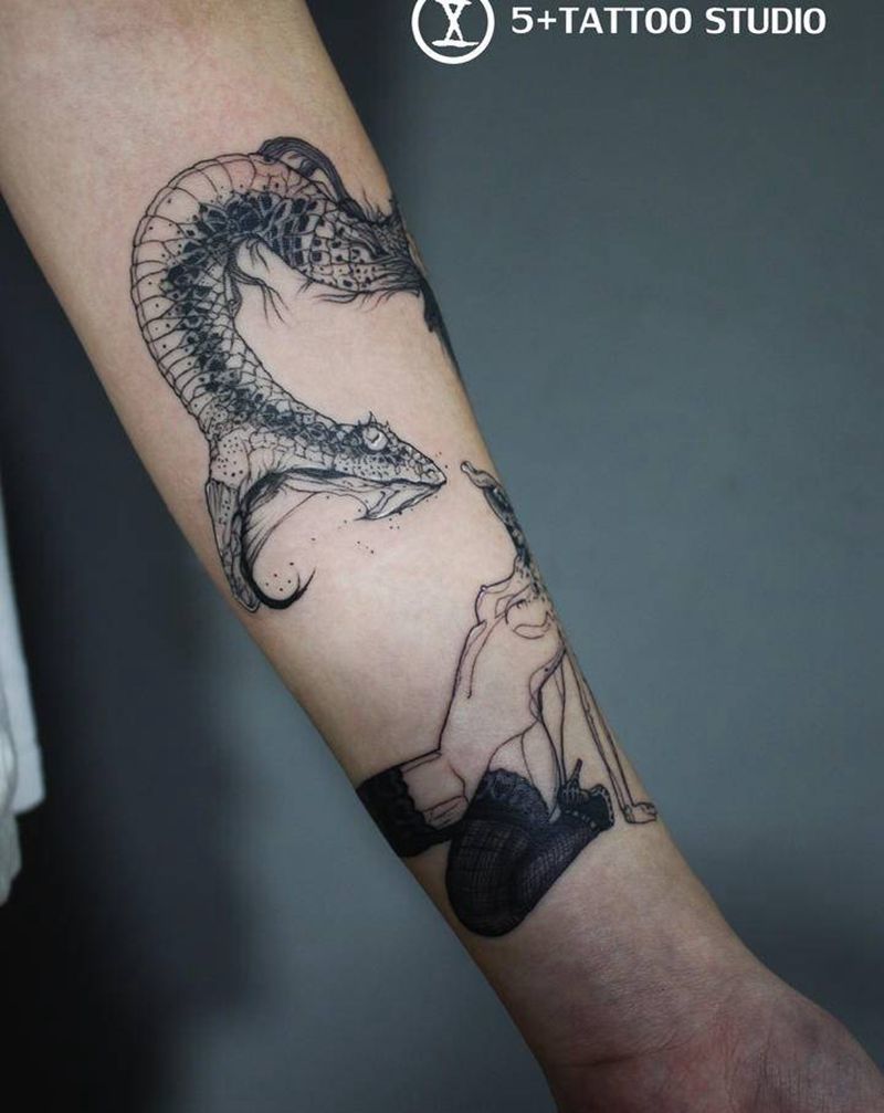 动物大战纹身图片_手臂点刺纹身图案