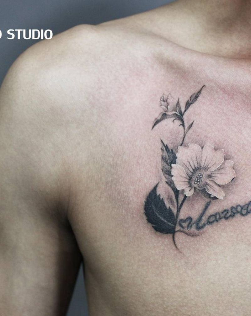 小花花纹身图片_胸部欧美写实纹身图案