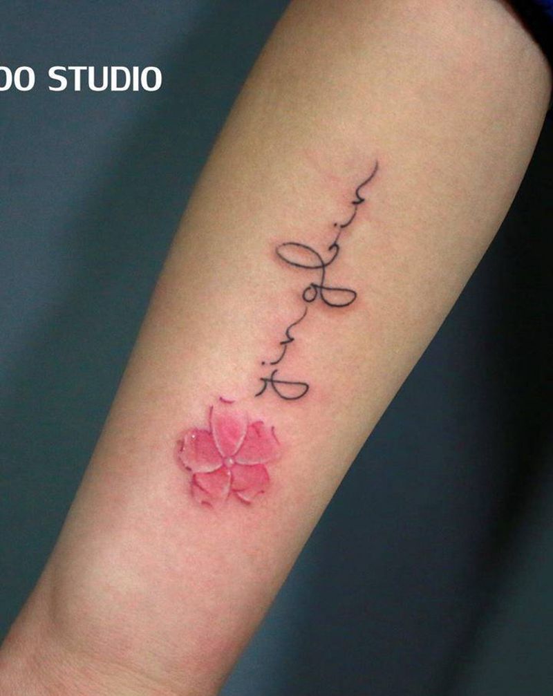 小花花纹身图片_手臂纹身图案