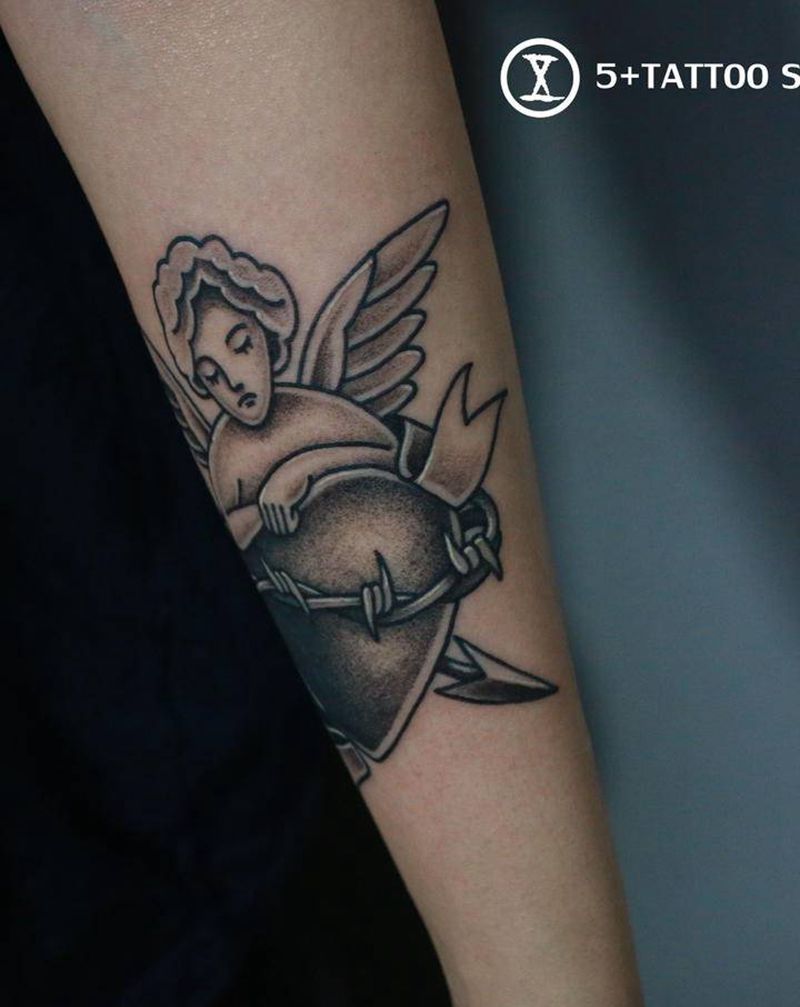 小天使纹身图片_手臂点刺Old School纹身图案