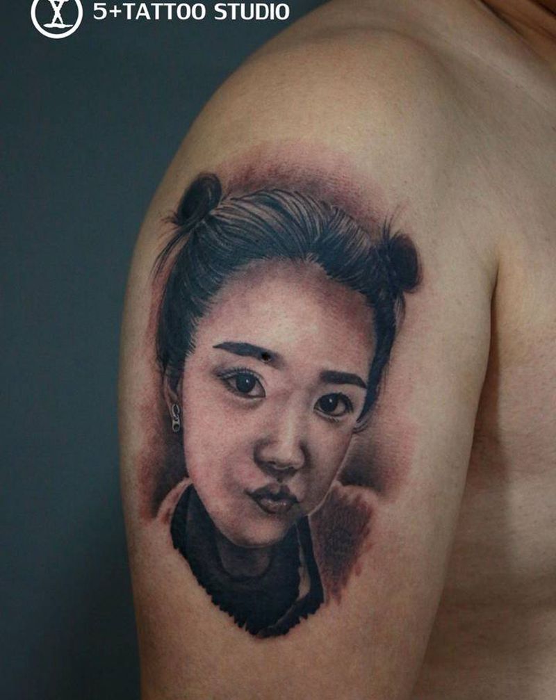 心爱的姑娘纹身图片_手臂欧美写实纹身图案